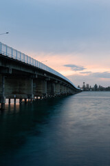 Cloudy sky view over Forster-Tuncurry Bridge, NSW, Australia.