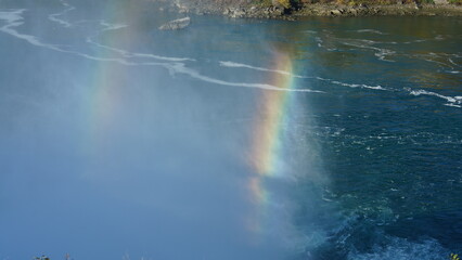 The beautiful Niagara waterfall landscape with the colorful rainbow in autumn