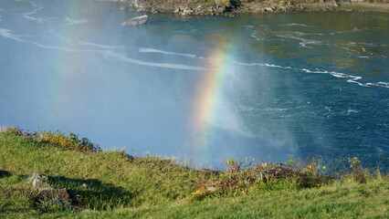 The beautiful Niagara waterfall landscape with the colorful rainbow in autumn