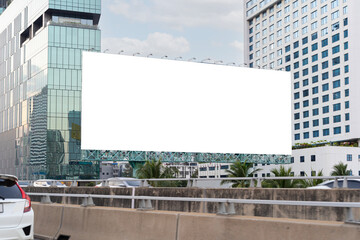 Large horizontal blank sign on a highway in Bangkok, Thailand. Traffic and sky, clipping path.