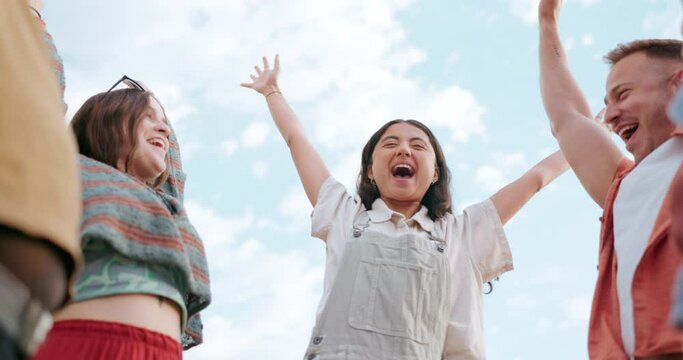 Motivation, outdoor or friends with hands stack for teamwork, support or solidarity together. Hug, low angle or group of excited people in huddle or happy celebration for goals, target or fun mission