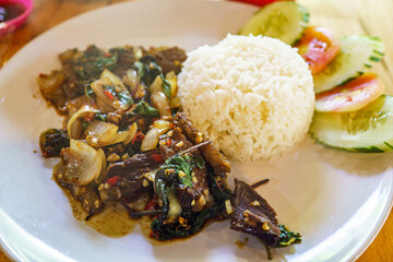 The delicious food of Thailand is called beef basil.