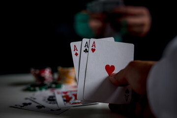 Best gamble in poker or lucky hand concept with player going all in with pocket aces considered the...