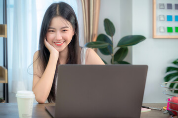 Asian business woman working in home office