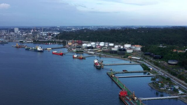Port Of Balikpapan And PT Pertamina Oil Refinery Plant In Kalimantan, Indonesia - Aerial Drone Shot
