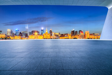 City square floor and Shanghai skyline with modern buildings scenery at night, China.