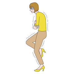 腕を組んで寒さに耐える女性