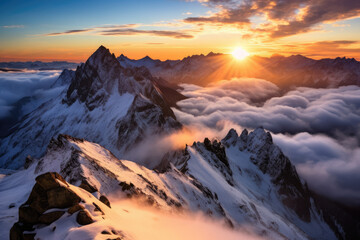 A mountaintop sunrise, with the first golden rays peeking over snow