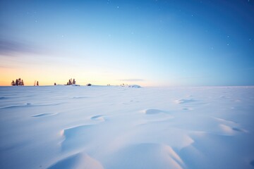 untouched snow field under starry sky