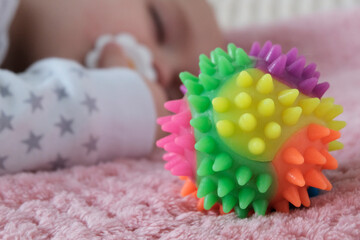 Baby and rubber massage needle ball multicolored. Sleep mode, care and hygiene of a child up to one year.