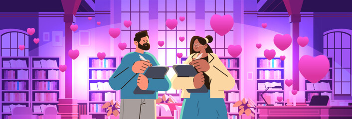 man woman couple in love reading books in library with pink hearts happy valentines day celebration concept