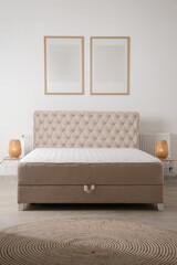 Beige velvet french bed with night table and lamp on side, cozy and simple bedroom