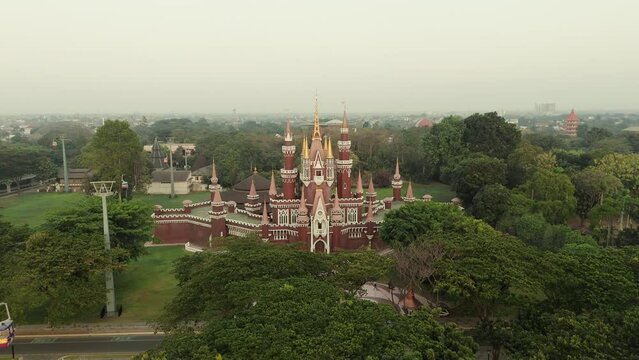 Drone footage aerial view of a beautiful castle at Taman Mini Indonesia Indah, Jakarta, Indonesia.