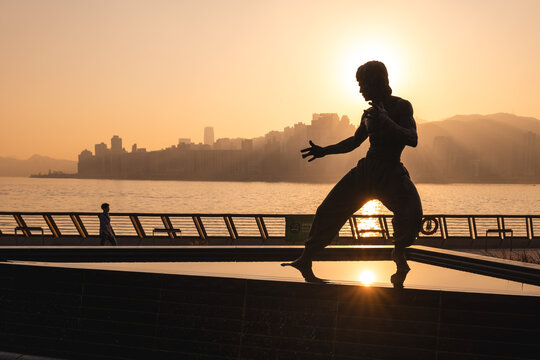 December 12, 2023: Statue of Bruce Lee, a bronze memorial statue of the martial artist Bruce Lee, is located on the Avenue of Stars attraction near the waterfront at Tsim Sha Tsui, Hong Kong, China.