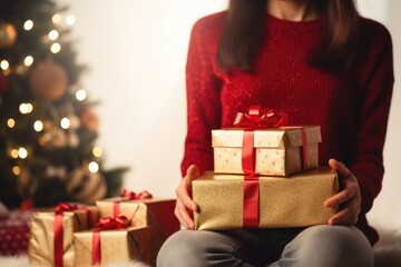 A woman holding a Christmas present and two boxes of presents. A fictional character created by Generated AI. 