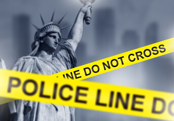 Police line near statue of liberty. Crime scene tape. Statue of liberty from USA. Concept of committing crimes in America. Police tape for prohibiting passage. Crime situation in USA.