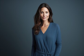 Obraz premium Beautiful woman in a blue dress A fictional character created by Generated AI. 