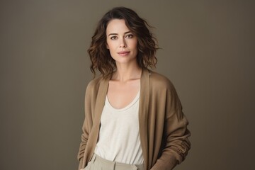 Fototapeta premium Stylish woman in a tan jacket and white shirt A fictional character created by Generated AI. 