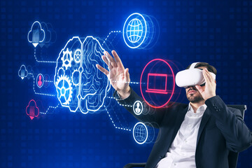 Attractive young european businessman with VR glasses using creative digital brain hologram with...