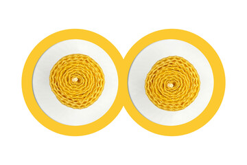 Pattern with a paraffin yellow twisted candle top view	