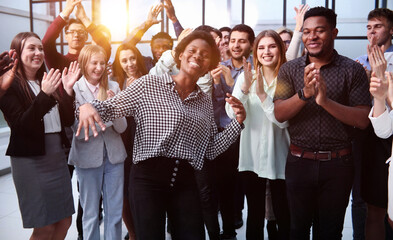 Business people clapping their hands after a seminar