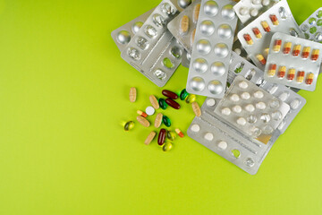 Color Pill Capsules on Color Background, Analgesic Pile, Transparent Painkiller Drugs Mix, Sedative...