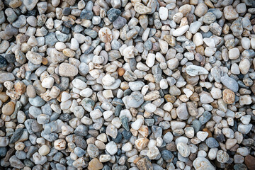 Texture of small stones, sea pebbles. full frame, copy space