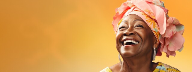 portrait of a happy African senior woman in pastel colors