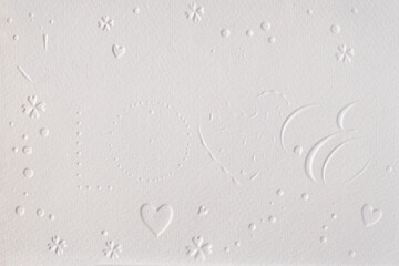 paper texture with embossed hearts and flowers