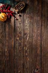 Rustic wooden surface featuring autumn harvest accents, perfect for fall season compositions, with a top-down perspective and space for text