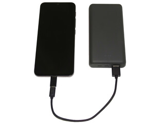 A smartphone charges from an external battery