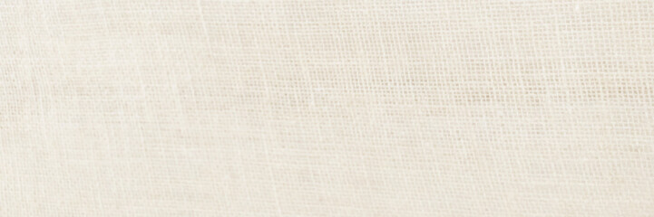 Jute hessian sackcloth woven organic burlap, hemp flax texture pattern background in light cream yellow beige brown color