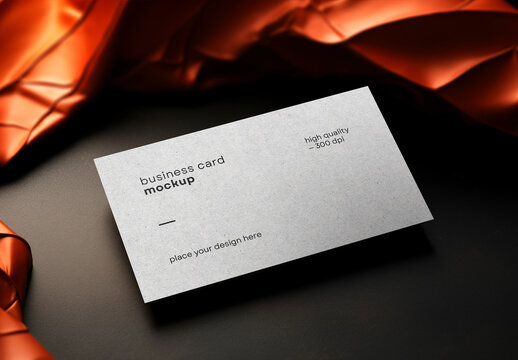 Business Card Mockup &ndash; Realistic Horizontal Card on Black Surface with Draped Satin Fabric for Professional Branding and Identity Presentation