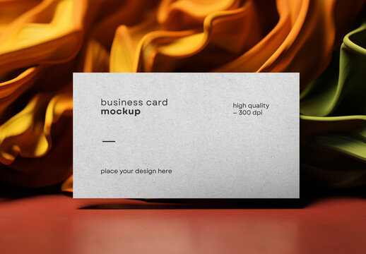 Business Card Mockup &ndash; Horizontal Minimal Card Scene with Elegant Paper Texture and Draped Colorful Fabric Background for Corporate or Creative Branding Display