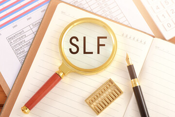 The magnifying glass on the chart is printed with the letter SLF