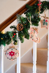 Festive decorations on the stairs in the hall