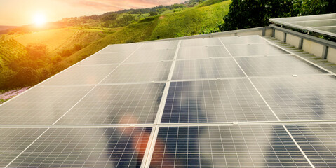 Solar panel against sunset sky background. Photovoltaic, alternative electricity source. Idea for...