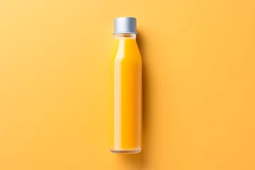 Abwaschbare Fototapete a bottle of orange juice © Vitalie