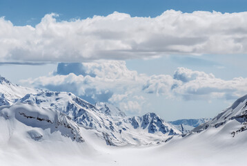 Snowy mountains. Beautiful landscape with snowy rocks. View from the top of Mount Elbrus - 696334289