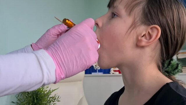 Visit to ENT doctor for child with sore throat. Healthcare concept for children health problems