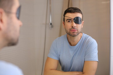 Man wearing a black eyepatch 