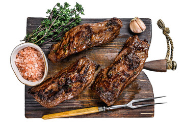 Grilled brisket steaks in bbq sauce on a wooden board.  Transparent background. Isolated.