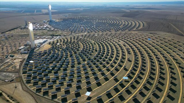 Aerial view of the Solar Power Towers PS10 and PS20 in Sanl&uacute;car la Mayor, Seville. Spain's stunning solar energy plant.  Concentrated solar power plant. Renewable energy. Green energy.