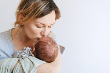 Mother and baby at home. Happy maternity and family. - 696344874