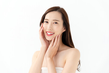 Fototapeta premium 頬に手を当てる女性