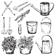  A set of garden tools, watering cans, buckets, trowels, hedge-clippers, rakes. Hand-drawn ink illustrations. Vector © Elena Valeto