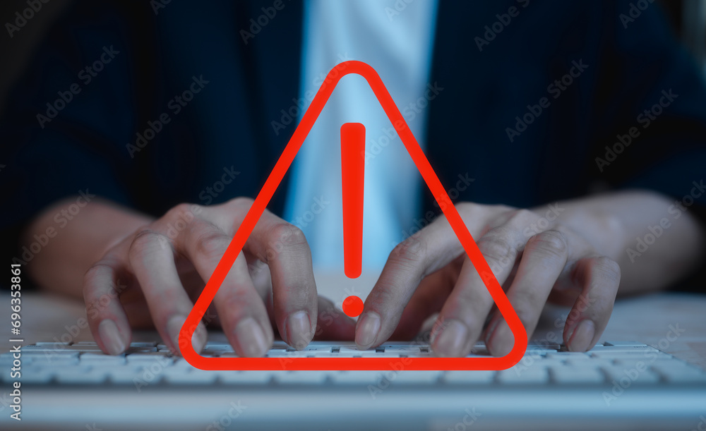 Aufkleber businessman typing on keyboard in concept of emergency warning alert sign on internet network online