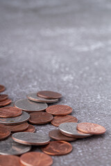 American coins and US dollars on a wooden table