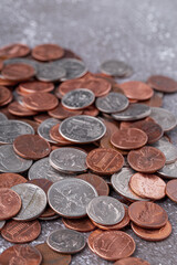 American coins and US dollars on a wooden table