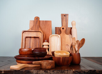 Plates, cups, cutting boards, and spoons made from wood